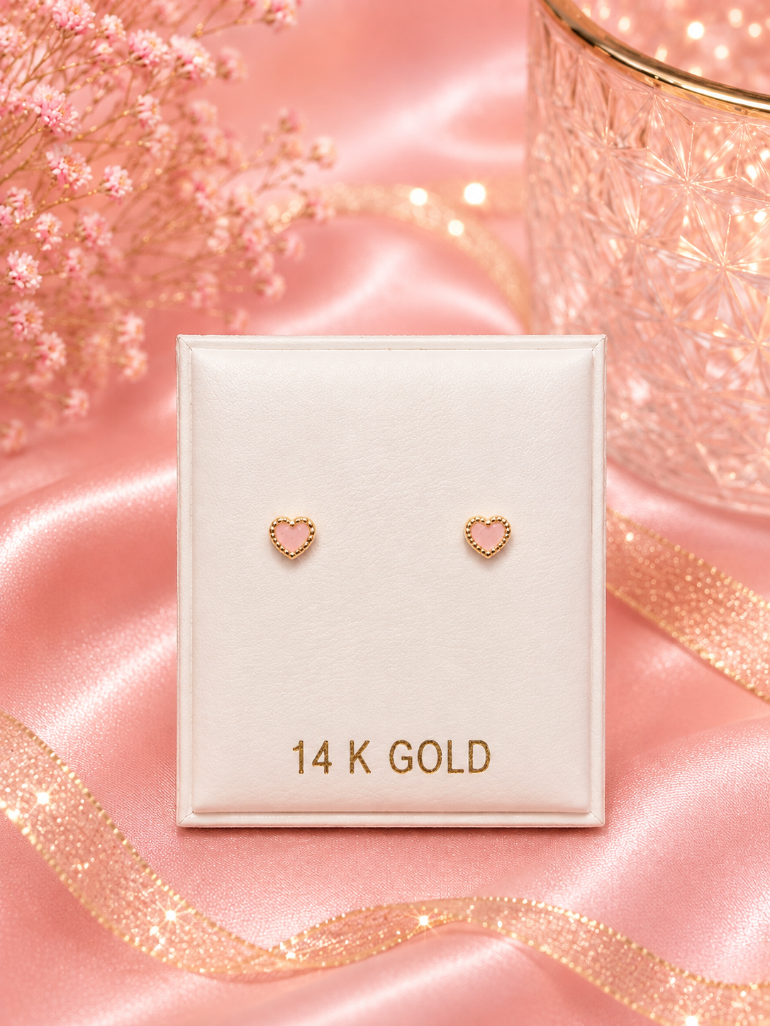 Corazón pequeño color rosa 14K